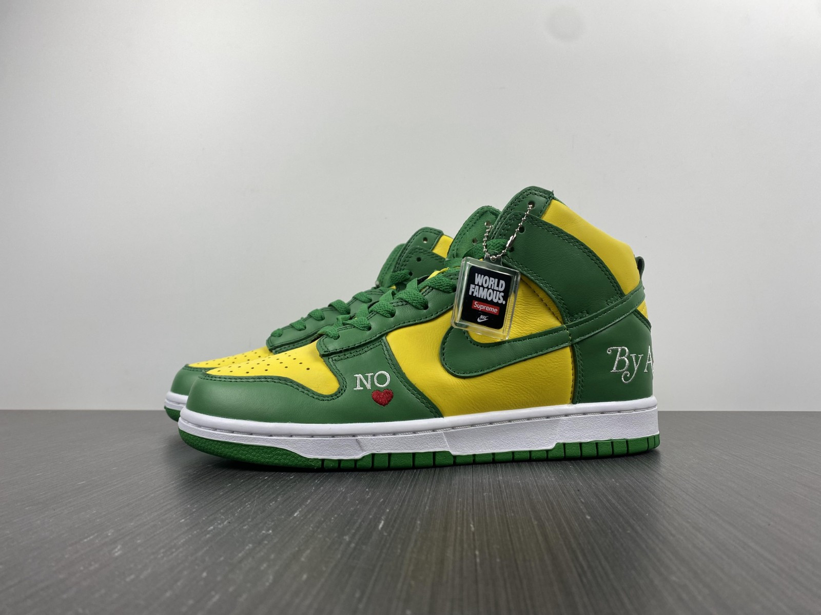 Supreme x Nike SB Dunk High “By Any Means” DN3741-700