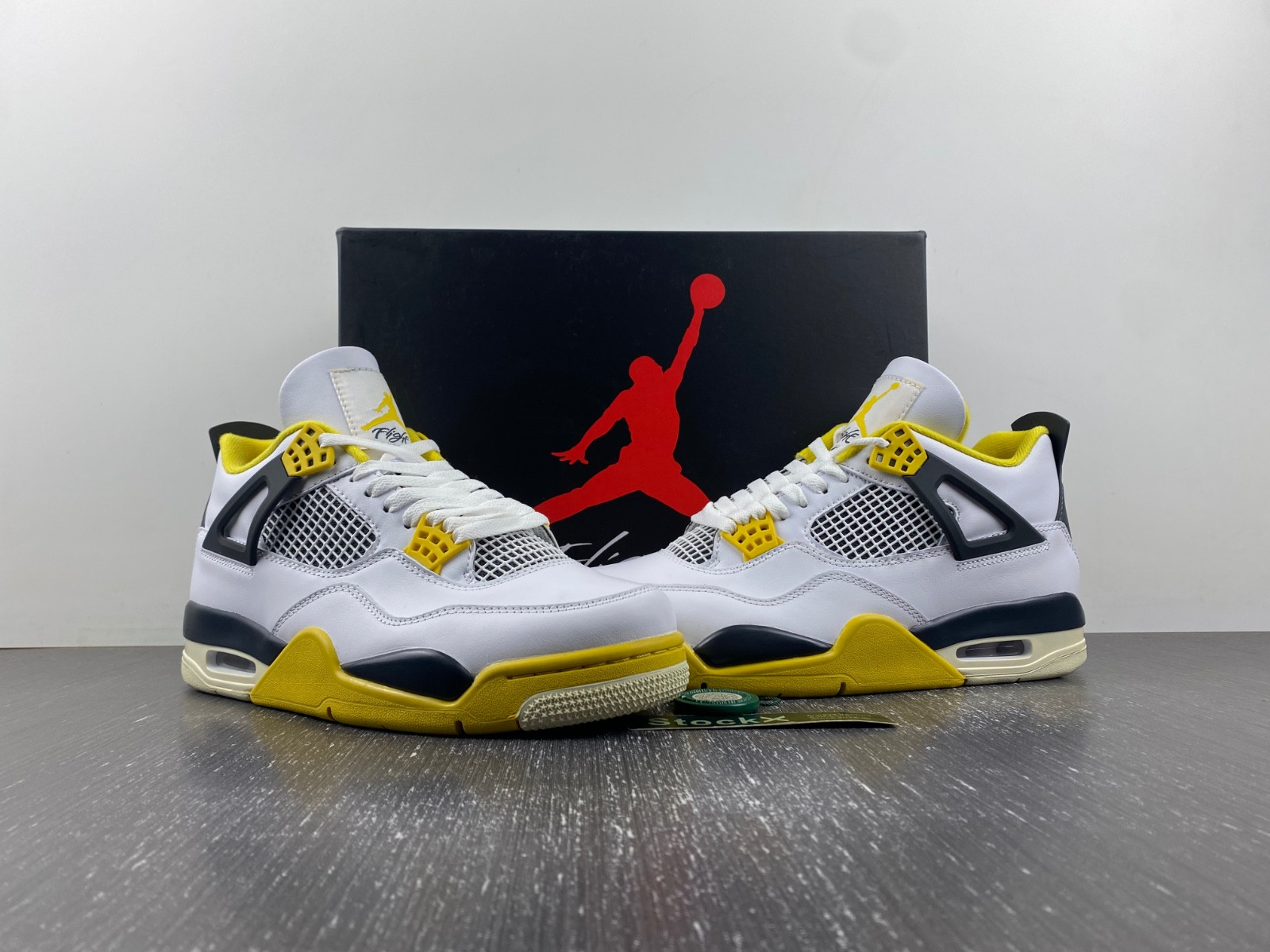 Air Jordan 4 WNNS “Vivid Sulfur” AQ9129-101