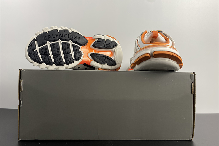 Ba*len*cia*ga track mule in white and orange mesh and nylon 653814w3cp59059